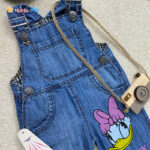 سرهمی جین دخترانه مام استایل طرح اردک آبی - نی نی استار